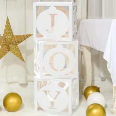 Papierové boxy s písmenami JOY a snehovými vločkami