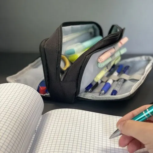 Trojité rozkládací pouzdro na psací potřeby
